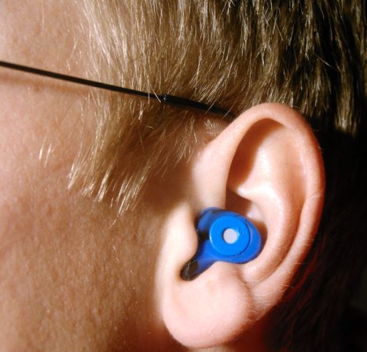 wearing wireless earbuds