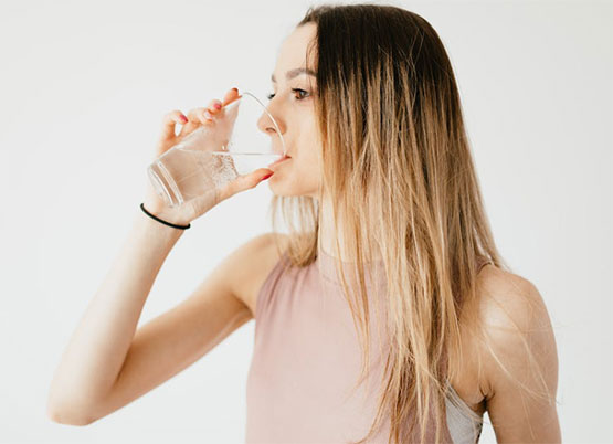 woman drinking ro water
