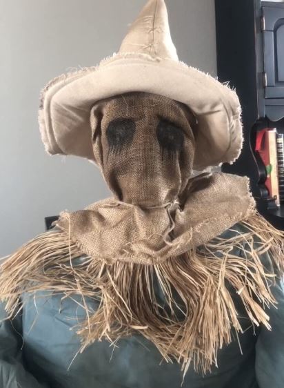 Spirit Halloween Animatronic Sitting Scarecrow