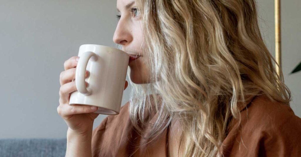 blonde-woman-sipping-coffee