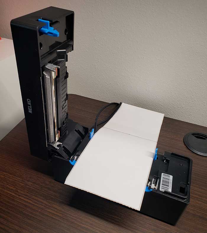 inserting paper into the nelko printer