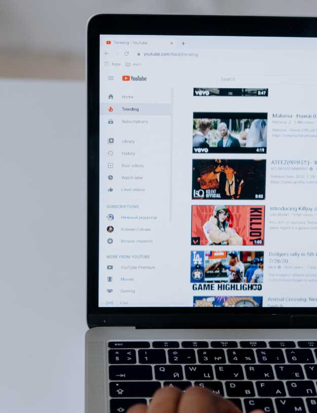 searching youtube on a laptop