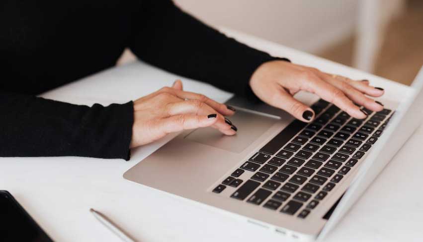 typing on a macbook keyboard