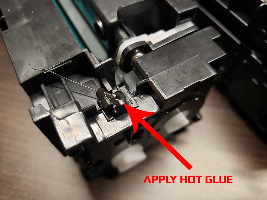 hp-toner-apply hot glue